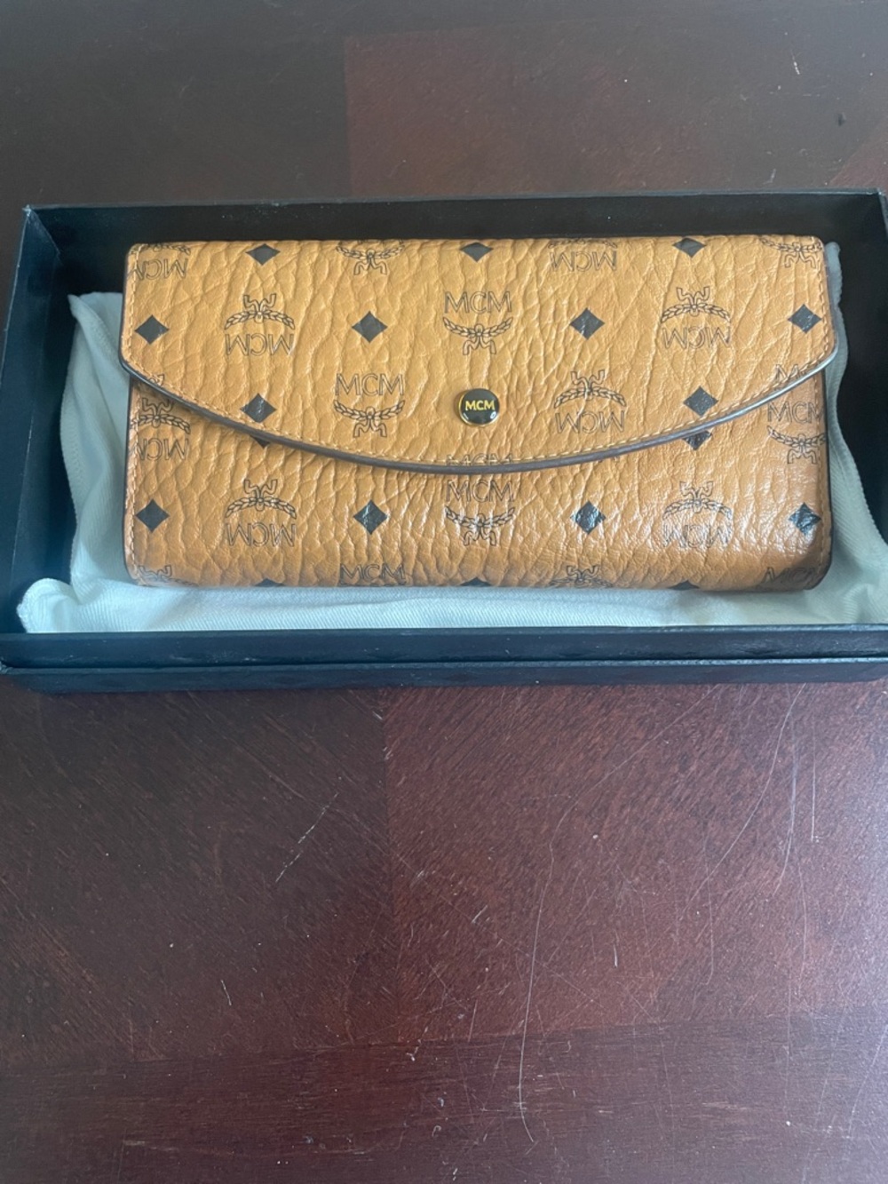 MCM Cognac Logo Foldover Wallet - Tan with Black Accents.